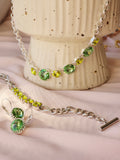 Rhodium Rivoli Leverback Earrings – 12mm Chrysolite Swarovski Crystal